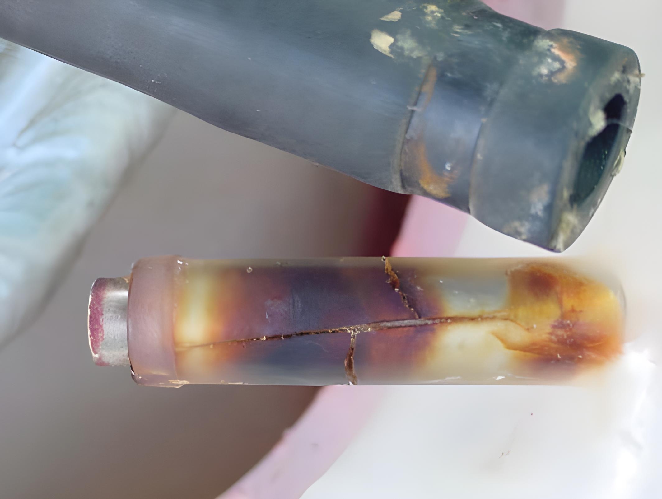 Tank return hose fitting cracks